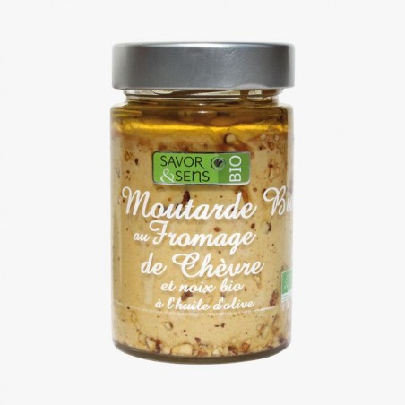 Organic mustard-based food preparation with goat cheese and organic nuts in olive oil